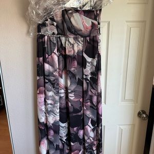 Long dress with a beading detail all around. Size 10 only worn once.